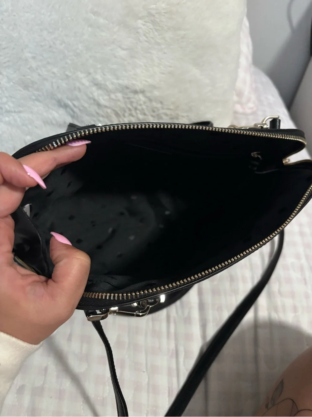 kate spade black leather satchel with gold-tone logo